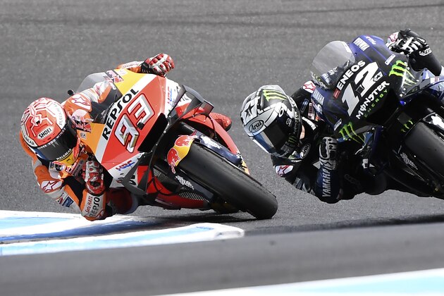 Repsol Honda Team rider Marc Marquez of Spain (L) follows Monster Energy Yamaha rider Maverick Vinales of Spain (R) during the MotoGP Australian motorcycle Grand Prix at Phillip Island on October 27, 2019. (Photo by WILLIAM WEST / AFP) / -- IMAGE RESTRICTED TO EDITORIAL USE - STRICTLY NO COMMERCIAL USE -- (Photo by WILLIAM WEST/AFP via Getty Images)
