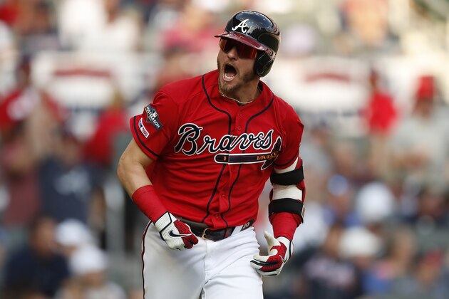 ATLANTA, GEORGIA - OCTOBER 04: Josh Donaldson #20 of the Atlanta Braves reacts after an RBI single off Jack Flaherty #22 of the St. Louis Cardinals in the first inning in game two of the National League Division Series at SunTrust Park on October 04, 2019 in Atlanta, Georgia. (Photo by Todd Kirkland/Getty Images)