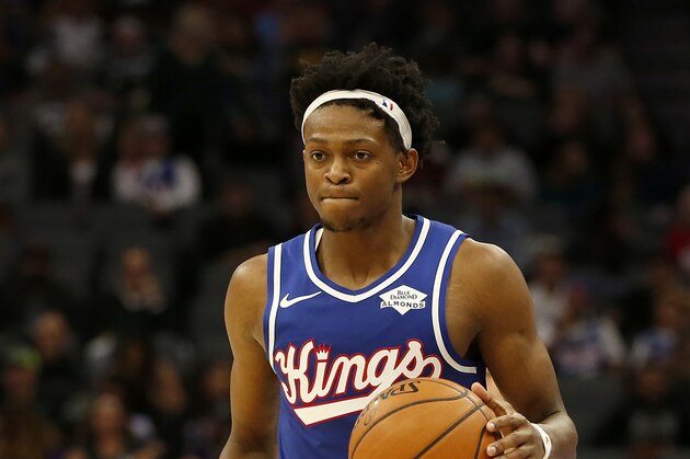 Sacramento Kings guard De'Aaron Fox brings the ball down court during the second half of an NBA basketball game against the Utah Jazz in Sacramento, Calif., Friday Nov. 1, 2019. The Kings won 102-101.(AP Photo/Rich Pedroncelli)