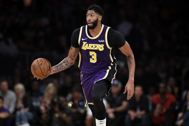 Los Angeles Lakers' Anthony Davis (3) dribbles during the first half of an NBA basketball game against the Miami Heat Friday, Nov. 8, 2019, in Los Angeles. (AP Photo/Marcio Jose Sanchez)