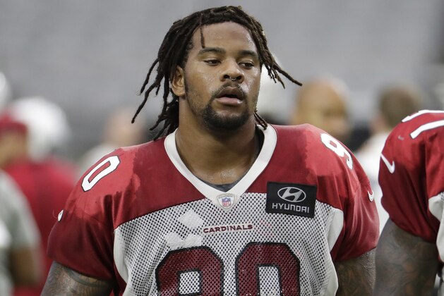 Arizona Cardinals defensive tackle Robert Nkemdiche (90) takes the field during an NFL football practice, Monday, July 30, 2018, in Glendale, Ariz. (AP Photo/Matt York)