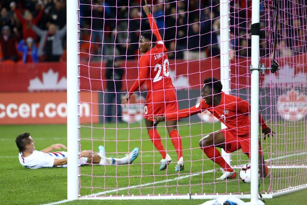 TORONTO, ON - OCTOBER 15:  Alphonso Davies #12 of Canada celebrates a goal during a CONCACAF Nations League game against the United States at BMO Field on October 15, 2019 in Toronto, Canada.  (Photo by Vaughn Ridley/Getty Images)