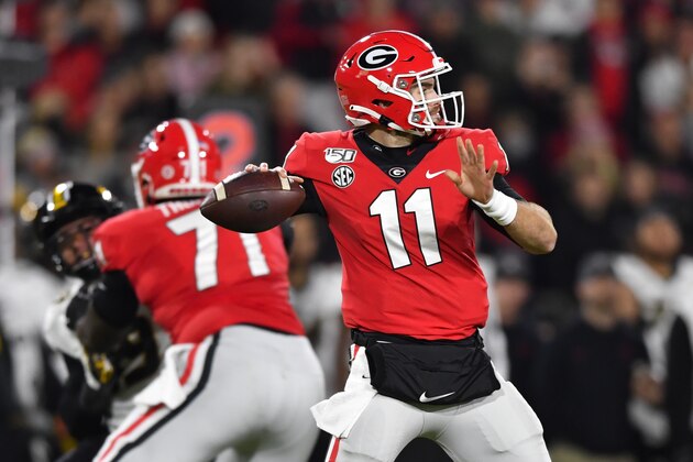 Georgia quarterback Jake Fromm (11) passes during the first quarter of an NCAA college football game against Missouri, Saturday, Nov. 9, 2019, in Athens, Ga. (AP Photo/John Amis)