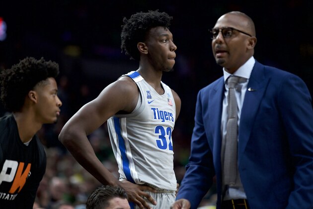 Memphis center James Wiseman watches from the bench after picking up a foul against Oregon during the second half of an NCAA college basketball game in Portland, Ore., Tuesday, Nov. 12, 2019. Oregon won 82-74. (AP Photo/Craig Mitchelldyer)