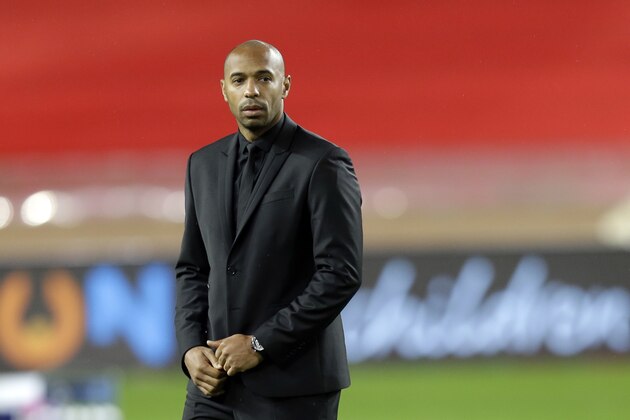 Monaco coach Thierry Henry watches the players as they train before the Champions League Group A soccer match between Monaco and Club Brugge at the Louis II stadium in Monaco, Tuesday, Nov. 6, 2018. (AP Photo/Claude Paris)