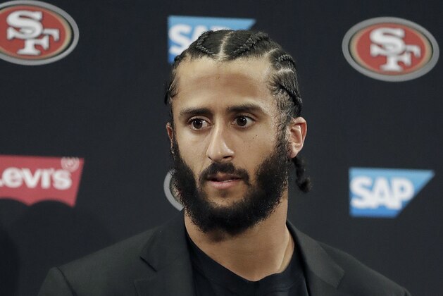FILE - This Jan. 1, 2017, file photo shows then San Francisco 49ers quarterback Colin Kaepernick speaking at a news conference after the team's NFL football game against the Seattle Seahawks in Santa Clara, Calif. NFL spokesman Joe Lockhart says the league expects Colin Kaepernick to be invited to the next meeting between owners and players to discuss social justice initiatives. Lockhart adds that the meeting probably will take place next week. (AP Photo/Marcio Jose Sanchez, File)