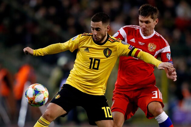 BRUSSEL, BELGIUM - MARCH 21: (L-R) Eden Hazard of Belgium, Kirill Nababkin of Russia  during the  EURO Qualifier match between Belgium  v Russia  at the Koning Boudewijn Stadium on March 21, 2019 in Brussel Belgium (Photo by Cees van Hoogdalem/Soccrates/Getty Images)