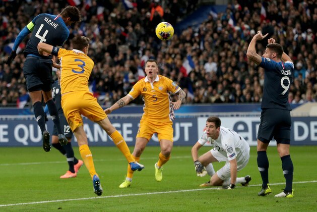 PARIS, FRANCE - NOVEMBER 14: Raphael Varane of France scores his team's first goal during the UEFA Euro 2020 Qualifier between France and Moldova on November 14, 2019 in Paris, France. (Photo by TF-Images/Getty Images)