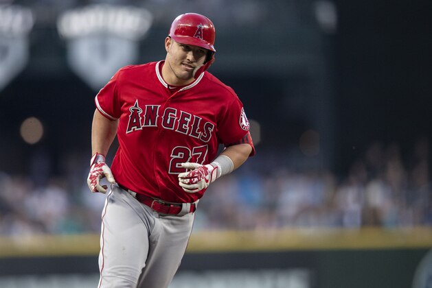 Los Angeles Angels' Mike Trout runs the bases after hitting a solo home run off Seattle Mariners starting pitcher Mike Leake during the sixth inning of a baseball game Friday, May 31, 2019, in Seattle. (AP Photo/Stephen Brashear)