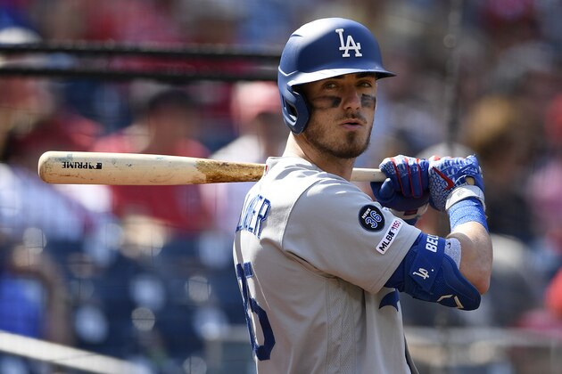 Los Angeles Dodgers' Cody Bellinger stands on deck during a baseball game against the Washington Nationals, Saturday, July 27, 2019, in Washington. (AP Photo/Nick Wass)