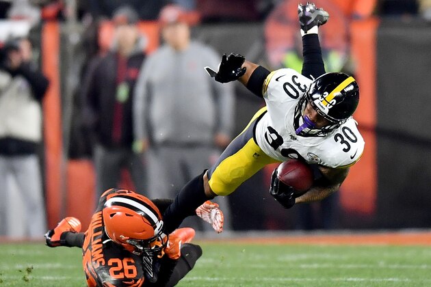 CLEVELAND, OHIO - NOVEMBER 14: Running back James Conner #30 of the Pittsburgh Steelers is tackled by cornerback Greedy Williams #26 of the Cleveland Browns  at FirstEnergy Stadium on November 14, 2019 in Cleveland, Ohio. (Photo by Jamie Sabau/Getty Images)