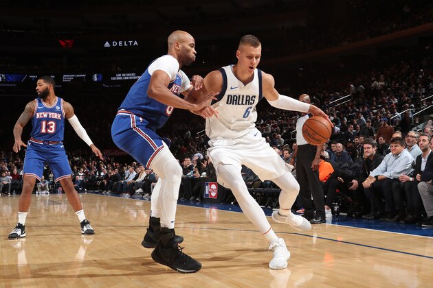 NEW YORK, NY - NOVEMBER 14: Kristaps Porzingis #6 of the Dallas Mavericks handles the ball against the New York Knicks on November 14, 2019 at Madison Square Garden in New York City, New York.  NOTE TO USER: User expressly acknowledges and agrees that, by downloading and or using this photograph, User is consenting to the terms and conditions of the Getty Images License Agreement. Mandatory Copyright Notice: Copyright 2019 NBAE  (Photo by Nathaniel S. Butler/NBAE via Getty Images)