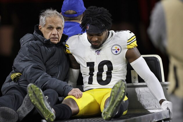 Pittsburgh Steelers wide receiver Diontae Johnson (18) carted back to the locker room after getting hit by Cleveland Browns strong safety Damarious Randall during the second half of an NFL football game, Thursday, Nov. 14, 2019, in Cleveland. Randall was ejected from the game. (AP Photo/Ron Schwane)