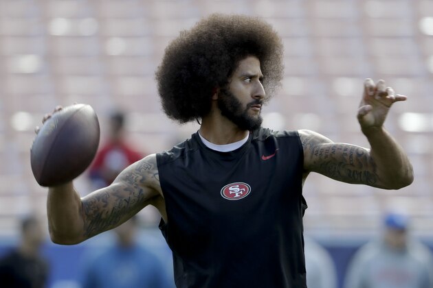 San Francisco 49ers quarterback Colin Kaepernick warms up before an NFL football game against the Los Angeles Rams Saturday, Dec. 24, 2016, in Los Angeles. (AP Photo/Rick Scuteri)
