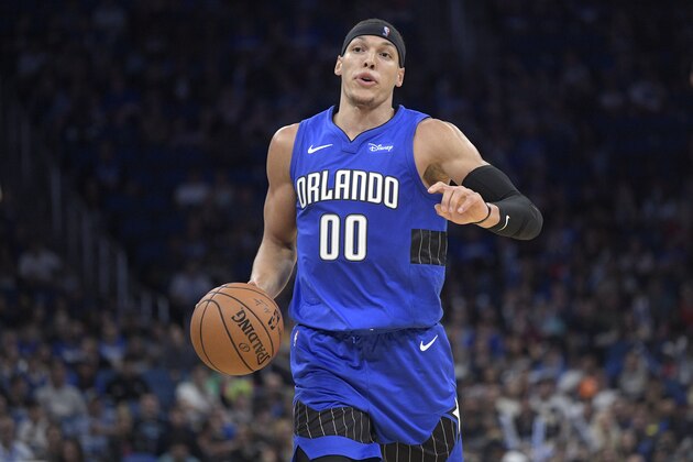 Orlando Magic forward Aaron Gordon (00) sets up for a play during the first half of an NBA basketball game against the Denver Nuggets Saturday, Nov. 2, 2019, in Orlando, Fla. (AP Photo/Phelan M. Ebenhack)