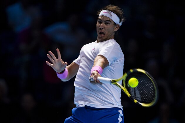 LONDON, ENGLAND - NOVEMBER 15: Rafael Nadal of Spain hits a forehand against Stefanos Tsitsipas of Greece during Day Six of the Nitto ATP World Tour Finals at The O2 Arena on November 15, 2019 in London, England. (Photo by TPN/Getty Images)