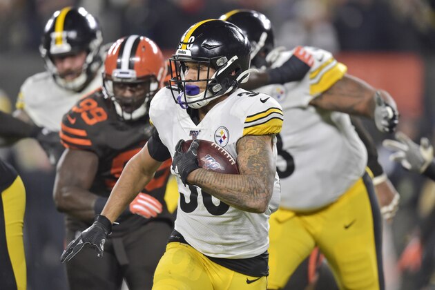 Pittsburgh Steelers running back James Conner (30) rushes against the Cleveland Browns during the first half of an NFL football game Thursday, Nov. 14, 2019, in Cleveland. (AP Photo/David Richard)