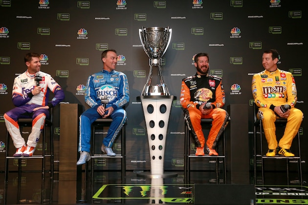 MIAMI, FLORIDA - NOVEMBER 14: (L-R) Denny Hamlin, driver of the #11 FedEx Express Toyota, Kevin Harvick, driver of the #4 Busch Light Ford, Martin Truex Jr., driver of the #19 Bass Pro Shops Toyota and Kyle Busch, driver of the #18 M&M's Toyota speaks with members of the media during NASCAR 2019 Championship 4 Media Day at the Edition Hotel on November 14, 2019 in Miami, Florida. (Photo by Sean Gardner/Getty Images)