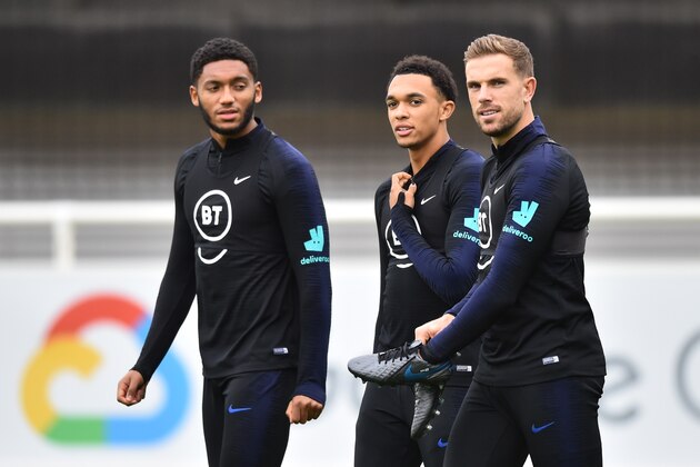 BURTON-UPON-TRENT, ENGLAND - OCTOBER 07: Joe Gomez, Trent Alexander-Arnold and Jordan Henderson of England look on as they train during an England Media Access day at St Georges Park on October 07, 2019 in Burton-upon-Trent, England. (Photo by Nathan Stirk/Getty Images)