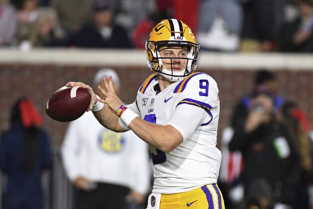 LSU quarterback Joe Burrow looks for a receiver during the first half of the team's NCAA college football game against Mississippi in Oxford, Miss., Saturday, Nov. 16, 2019. (AP Photo/Thomas Graning)