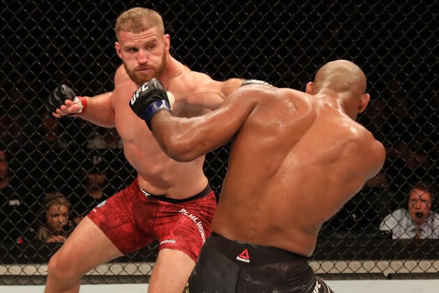 SAO PAULO, BRAZIL - NOVEMBER 16:  (L-R) Jan Blachowicz of Poland punches Ronaldo 'Jacare' Souza of Brazil in their light heavyweight fight during the UFC Fight Night event at Ibirapuera Gymnasium on November 16, 2019 in Sao Paulo, Brazil. (Photo by Alexandre Schneider/Zuffa LLC via Getty Images)