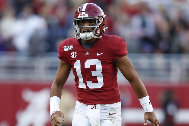 TUSCALOOSA, AL - NOVEMBER 09: Tua Tagovailoa #13 of the Alabama Crimson Tide reacts after a touchdown is scored during the first half against the LSU Tigers at Bryant-Denny Stadium on November 9, 2019 in Tuscaloosa, Alabama. (Photo by Todd Kirkland/Getty Images)