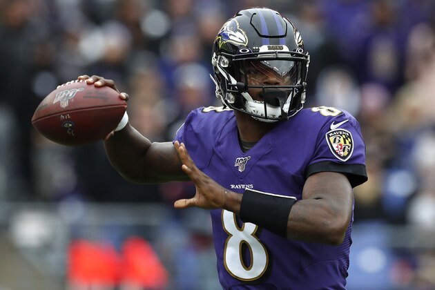BALTIMORE, MARYLAND - NOVEMBER 17: Lamar Jackson #8 of the Baltimore Ravens looks to throw a pass against the Houston Texans during the first half in the game at M&T Bank Stadium on November 17, 2019 in Baltimore, Maryland. (Photo by Todd Olszewski/Getty Images)