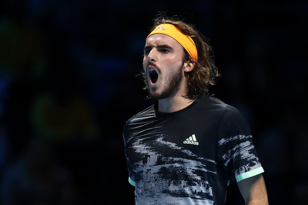 LONDON, ENGLAND - NOVEMBER 17: Stefanos Tsitsipas of Greece celebrates in his singles final match against Dominic Thiem of Austria during Day Eight of the Nitto ATP World Tour Finals at The O2 Arena on November 17, 2019 in London, England. (Photo by Julian Finney/Getty Images)