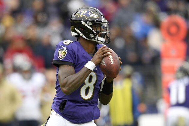 Baltimore Ravens quarterback Lamar Jackson looks to pass against the Houston Texans during the first half of an NFL football game, Sunday, Nov. 17, 2019, in Baltimore. (AP Photo/Nick Wass)
