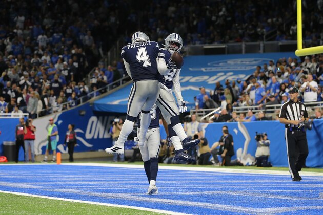 DETROIT, MI - NOVEMBER 17: Ezekiel Elliott #21 of the Dallas Cowboys celebrates his fourth quarter touchdown with Dak Prescott #4 of the Dallas Cowboys against the Detroit Lions at Ford Field on November 17, 2019 in Detroit, Michigan. (Photo by Rey Del Rio/Getty Images)