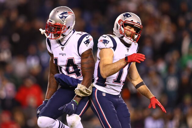 PHILADELPHIA, PENNSYLVANIA - NOVEMBER 17:  Julian Edelman #11 of the New England Patriots celebrates with Mohamed Sanu #14 after throwing a touchdown pass to Phillip Dorsett II #13 (not pictured) during the third quarter against the Philadelphia Eagles at Lincoln Financial Field on November 17, 2019 in Philadelphia, Pennsylvania. (Photo by Mitchell Leff/Getty Images)