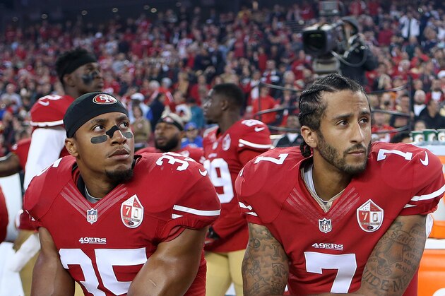 San Francisco 49ers Eric Reid (35) and Colin Kaepernick (7) take a knee during the National Anthem prior to their season opener against the Los Angeles Rams during an NFL football game Monday, Sept. 12, 2016, in Santa Clara, CA. The Niners won 28-0. (Daniel Gluskoter/AP Images for Panini)