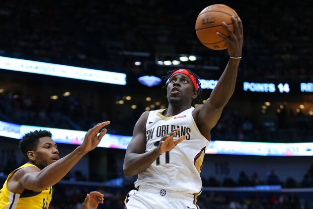 NEW ORLEANS, LOUISIANA - NOVEMBER 17: Jrue Holiday #11 of the New Orleans Pelicans shoots against Glenn Robinson III #22 of the Golden State Warriors during the first half of a game at the Smoothie King Center on November 17, 2019 in New Orleans, Louisiana. NOTE TO USER: User expressly acknowledges and agrees that, by downloading and or using this Photograph, user is consenting to the terms and conditions of the Getty Images License Agreement. (Photo by Jonathan Bachman/Getty Images)
