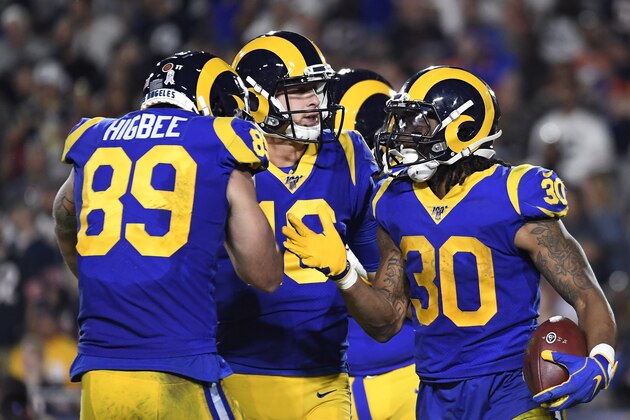 LOS ANGELES, CA - NOVEMBER 17: Todd Gurley #30 of the Los Angeles Rams celebrates his touchdown with quarterback Jared Goff #16 and Tyler Higbee #89 during the second quarter against the Chicago Bears at Los Angeles Memorial Coliseum on November 17, 2019 in Los Angeles, California. (Photo by Kevork Djansezian/Getty Images)