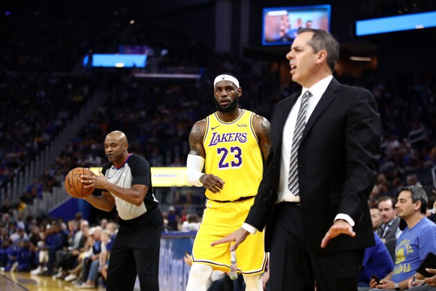 SAN FRANCISCO, CALIFORNIA - OCTOBER 05:  LeBron James #23 looks at head coach Frank Vogel of the Los Angeles Lakers during their game against the Golden State Warriors at Chase Center on October 05, 2019 in San Francisco, California.  NOTE TO USER: User expressly acknowledges and agrees that, by downloading and or using this photograph, User is consenting to the terms and conditions of the Getty Images License Agreement.  (Photo by Ezra Shaw/Getty Images)