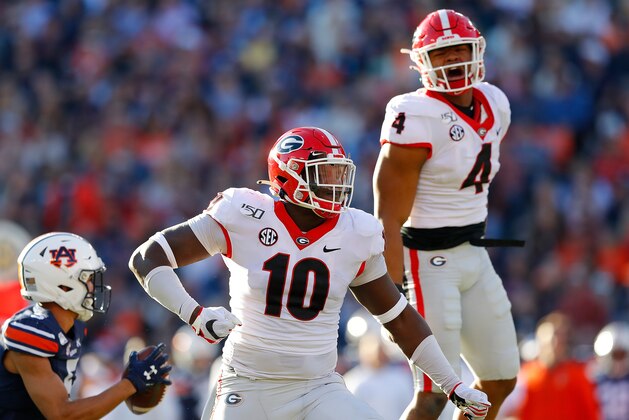 AUBURN, ALABAMA - NOVEMBER 16:  Malik Herring #10 of the Georgia Bulldogs reacts after a defensive stop against Anthony Schwartz #5 of the Auburn Tigers in the first half at Jordan-Hare Stadium on November 16, 2019 in Auburn, Alabama. (Photo by Kevin C. Cox/Getty Images)