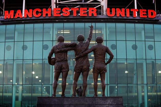 MANCHESTER, ENGLAND - FEBRUARY 12:  A statue of the United Trinity of George Best, Denis Law, and Sir Bobby Charlton at Old Trafford during the UEFA Champions League Round of 16 First Leg match between Manchester United and Paris Saint-Germain at Old Trafford on February 12, 2019 in Manchester, England. (Photo by Marc Atkins/Getty Images)