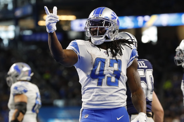 Detroit Lions running back Bo Scarbrough points to the crowd during the first half of an NFL football game against the Dallas Cowboys, Sunday, Nov. 17, 2019, in Detroit. (AP Photo/Paul Sancya)