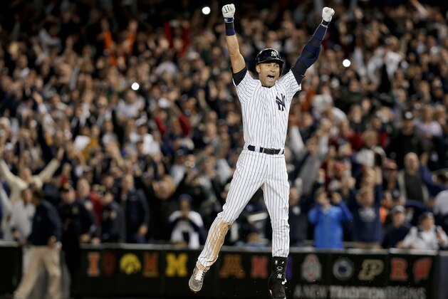 FOR USE AS DESIRED, YEAR END PHOTOS - FILE - New York Yankee Derek Jeter jumps after hitting the game-winning single against the Baltimore Orioles in the ninth inning of a baseball game, Thursday, Sept. 25, 2014, in New York. The Yankees won 6-5. It was Jeter's last home game of his career at Yankee Stadium.  (AP Photo/Julie Jacobson, File)