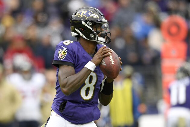 Baltimore Ravens quarterback Lamar Jackson looks to pass against the Houston Texans during the first half of an NFL football game, Sunday, Nov. 17, 2019, in Baltimore. (AP Photo/Nick Wass)