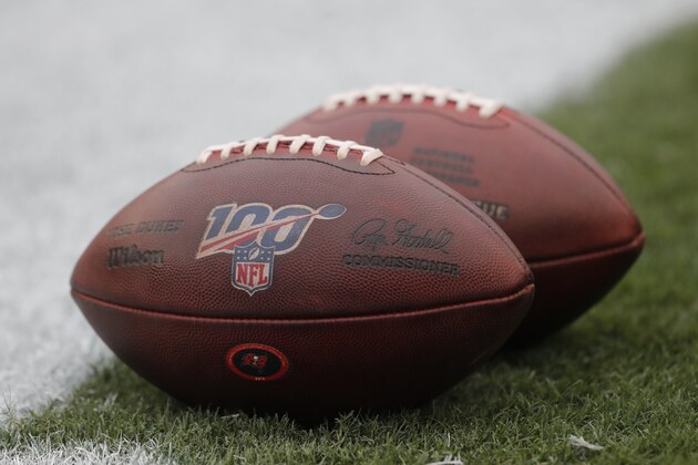 NFL footballs before an NFL football game between the Tampa Bay Buccaneers and the New Orleans Saints Sunday, Nov. 17, 2019, in Tampa, Fla. (AP Photo/Mark LoMoglio)