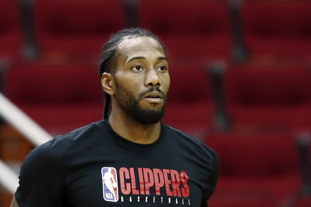 HOUSTON, TX - NOVEMBER 13: Kawhi Leonard #2 of the LA Clippers looks on before the game against the Houston Rockets on November 13, 2019 at the Toyota Center in Houston, Texas. NOTE TO USER: User expressly acknowledges and agrees that, by downloading and or using this photograph, User is consenting to the terms and conditions of the Getty Images License Agreement. Mandatory Copyright Notice: Copyright 2019 NBAE (Photo by Chris Elise/NBAE via Getty Images)