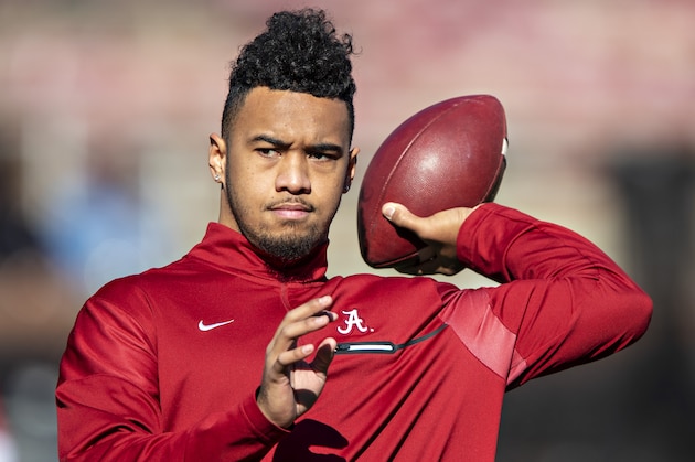 FAYETTEVILLE, AR - NOVEMBER 9:   Tua Tagovailoa #13 of the Alabama Crimson Tide warms up before a game against the Mississippi State Bulldogs at Davis Wade Stadium on November 16, 2019 in Starkville, Mississippi.  The Crimson Tide defeated the Bulldogs 38-7.  (Photo by Wesley Hitt/Getty Images)