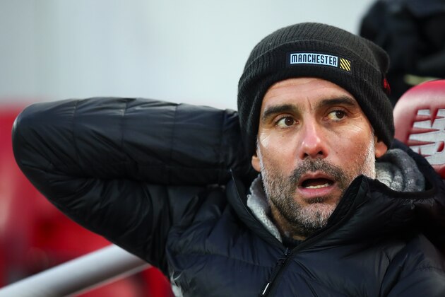 LIVERPOOL, ENGLAND - NOVEMBER 10: Pep Guardiola the head coach / manager of Manchester City during the Premier League match between Liverpool FC and Manchester City at Anfield on November 10, 2019 in Liverpool, United Kingdom. (Photo by Robbie Jay Barratt - AMA/Getty Images)