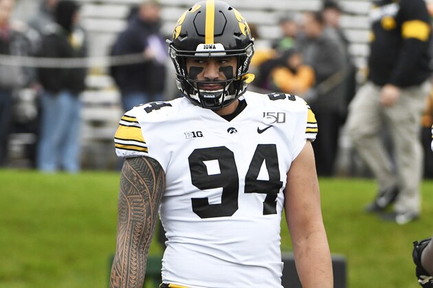 Iowa defensive end A.J. Epenesa (94) warms up before a game against Northwestern an NCAA college football game, Saturday, Oct. 26, 2019, in Evanston, Ill. (AP Photo/David Banks)
