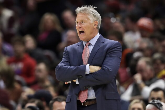 Philadelphia 76ers head coach Brett Brown yells instructions to players in the second half of an NBA basketball game against the Cleveland Cavaliers, Sunday, Nov. 17, 2019, in Cleveland. The 76ers won 114-95. (AP Photo/Tony Dejak)
