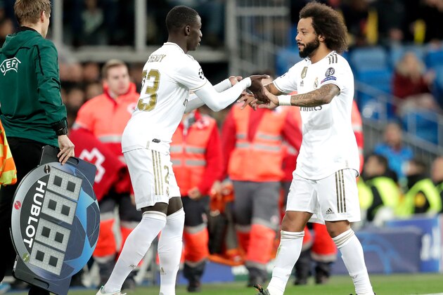 MADRID, SPAIN - NOVEMBER 6: (L-R) F. Mendy of Real Madrid, Marcelo of Real Madrid  during the UEFA Champions League  match between Real Madrid v Galatasaray at the Santiago Bernabeu on November 6, 2019 in Madrid Spain (Photo by David S. Bustamante/Soccrates/Getty Images)