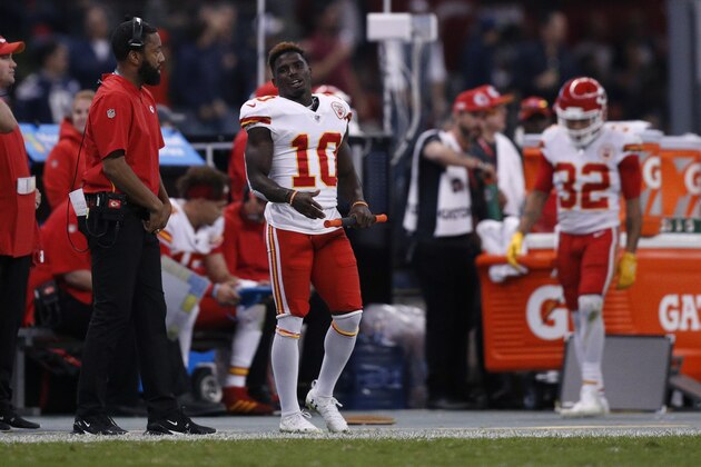 Kansas City Chiefs wide receiver Tyreek Hill (10) stands on the sidelines after an injury during the second half of an NFL football game against the Los Angeles Chargers, Monday, Nov. 18, 2019, in Mexico City. (AP Photo/Rebecca Blackwell)