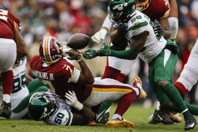 LANDOVER, MD - NOVEMBER 17: Dwayne Haskins #7 of the Washington Redskins loses the ball as he is sacked by Frankie Luvu #50 of the New York Jets during the second half at FedExField on November 17, 2019 in Landover, Maryland. (Photo by Scott Taetsch/Getty Images)