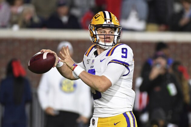 LSU quarterback Joe Burrow looks for a receiver during the first half of the team's NCAA college football game against Mississippi in Oxford, Miss., Saturday, Nov. 16, 2019. (AP Photo/Thomas Graning)